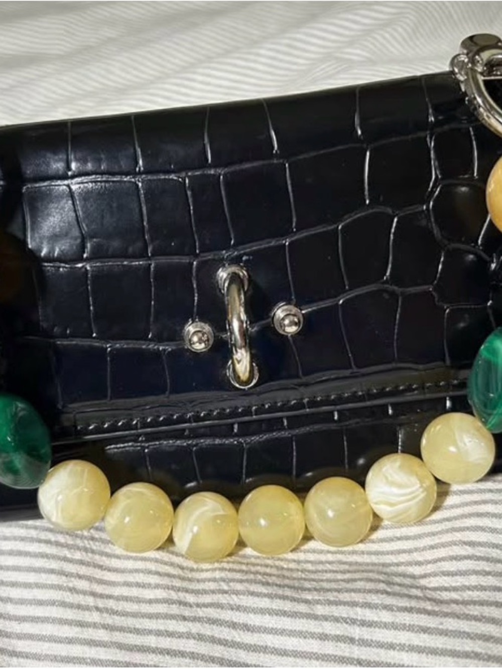Couturist leather triangle bag